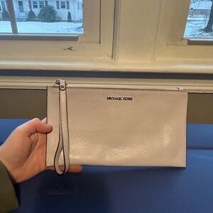 Michael Kors Jet set large zip clutch wristlet in light pink